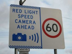 Signage indicating red-light and speed cameras in Australia